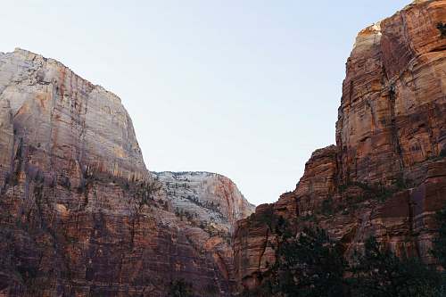 mountain mountain view under blue sky during daytime cliff